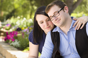 Image showing Young Engaged Couple Relaxing in the Park