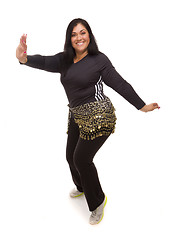 Image showing Attractive Hispanic Woman Dancing Zumba on White