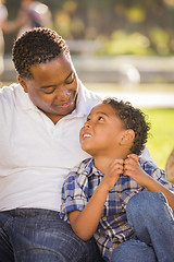 Image showing Happy Mixed Race Father and Son Playing