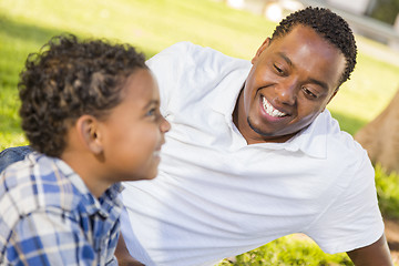 Image showing Happy Mixed Race Father and Son Playing