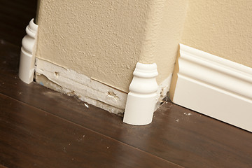 Image showing New Baseboard and Bull Nose Corners with Laminate Flooring