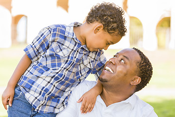 Image showing Happy Mixed Race Father and Son Playing