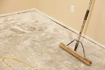 Image showing Concrete House Floor with Broom Ready for Flooring Installation