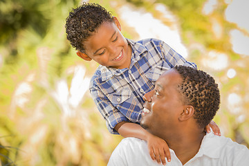 Image showing Happy Mixed Race Father and Son Playing