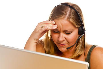 Image showing Businesswoman with Phone Headset and Headache