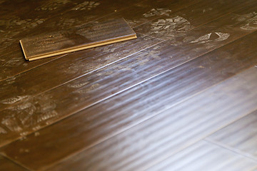 Image showing Newly Installed Dusty Brown Laminate Flooring