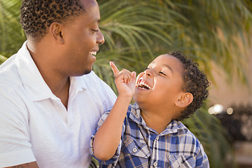 Image showing Happy Mixed Race Father and Son Playing