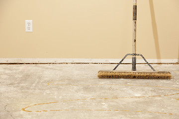 Image showing Concrete House Floor with Broom Ready for Flooring Installation