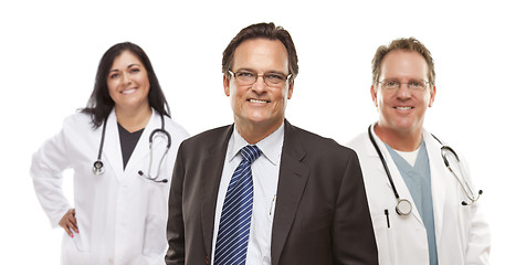Image showing Businessman with Medical Personnel Behind