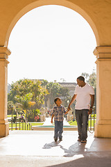 Image showing Mixed Race Father and Son Walking in the Park