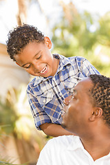 Image showing Happy Mixed Race Father and Son Playing