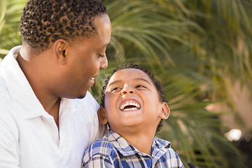 Image showing Happy Mixed Race Father and Son Playing