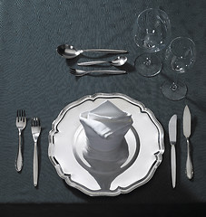 Image showing exclusive place setting on dark tablecloth