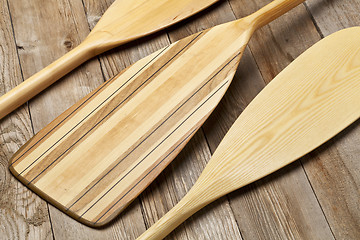 Image showing wooden canoe paddles