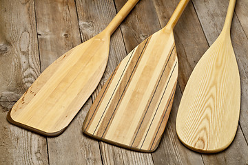 Image showing wooden canoe paddles