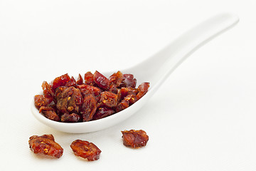 Image showing spoon of dried cranberries