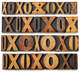 Image showing letters O and X in wood type