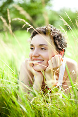 Image showing girl on green field 