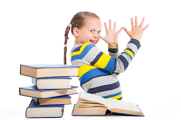 Image showing schoolgirl with books being teased on isolated white