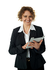 Image showing Aged businesswoman using touch screen device