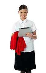 Image showing Pretty teenager posing with wireless tablet pc