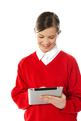 Image showing Happy young girl using tablet pc