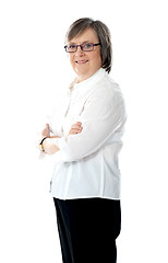 Image showing Female employee posing with crossed arms