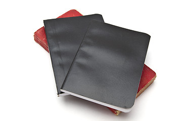 Image showing Red and black notebooks 