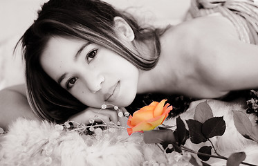 Image showing Asian girl with a rose