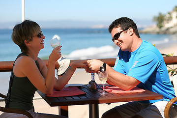 Image showing Happy couple at a seaside cafe