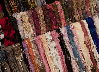 Image showing Multicoloured scarves on market