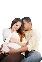 Image showing Husband and 8 months pregnant wife. 