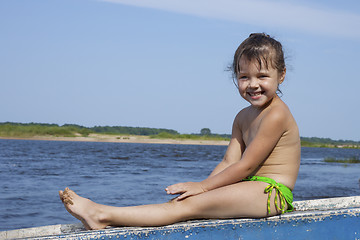 Image showing Baby girl wet after swimming