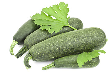 Image showing Four large courgettes