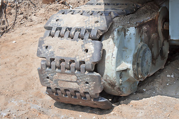 Image showing Caterpillar excavator standing on ground