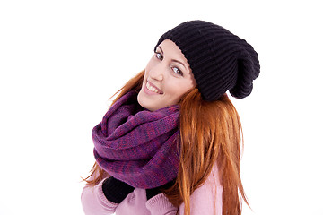 Image showing young beautiful woman with hat gloves and scarf in winter isolated