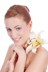 Image showing beautiful natural woman face with flower isolated 