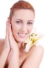 Image showing beautiful natural woman face with flower isolated 