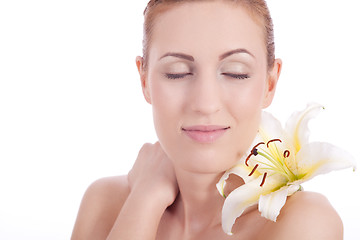 Image showing beautiful natural woman face with flower isolated 