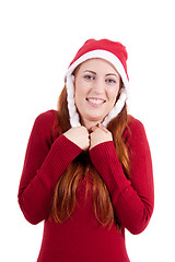 Image showing smiling young woman at christmastime in red clothes isolated