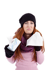Image showing woman with tissue and spray feels unwell with flu