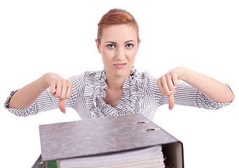 Image showing business woman in office looks at unbelievable folder stack