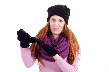 Image showing young beautiful woman with hat gloves and scarf in winter isolated