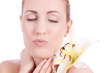 Image showing beautiful natural woman face with flower isolated 