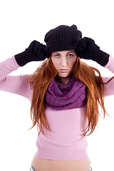 Image showing young beautiful woman with hat gloves and scarf in winter isolated