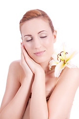 Image showing beautiful natural woman face with flower isolated 