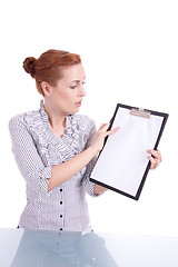 Image showing young woman with clipboard isolated on white