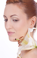 Image showing beautiful natural woman face with flower isolated 