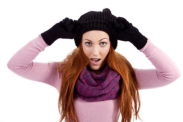 Image showing young beautiful woman with hat gloves and scarf in winter isolated