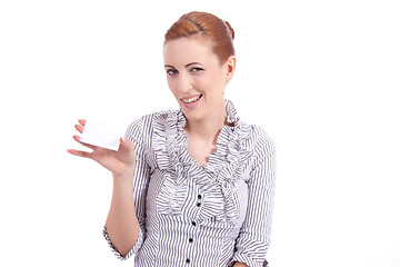 Image showing beautiful young girl is holding a blank card in hand isolated